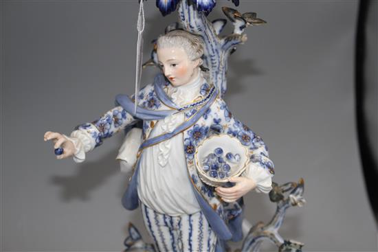 A pair of Meissen porcelain candelabra, modelled with lady and gallant stems, height 46cm